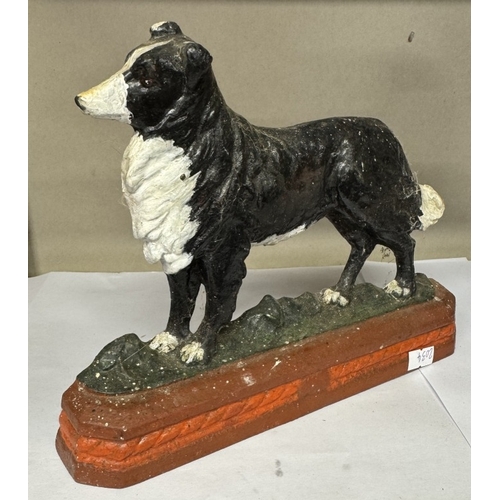 1828 - 2 cast iron dog door stops