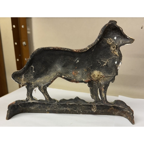 1828 - 2 cast iron dog door stops