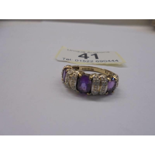 41 - A vintage 9ct gold amethyst and diamond ring, size M, 3.8 grams.