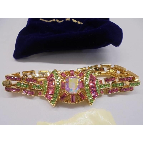 48 - A Butler & Wilson crystal art deco style fan link bracelet in yellow metal.