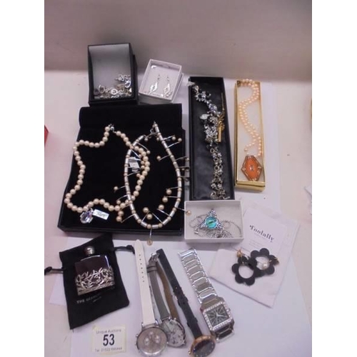 53 - A mixed lot of necklaces, earings, watches etc.,