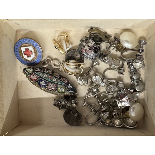 1850 - A box of costume jewellery including bangles, micro mosaic brooch & napkin rings