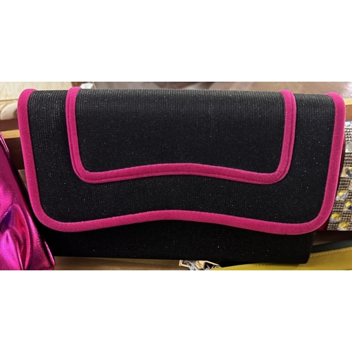 1875 - A quantity of clutch bags, red clutch, black & pink clutch, pink evening bag & cobalt blue clutch, n... 