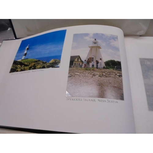 57 - Three albums of Lighthouse related postcards and original photographs from around the world.