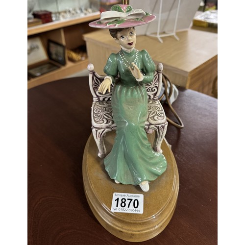 1870 - A vintage ceramic table lamp of a seated lady