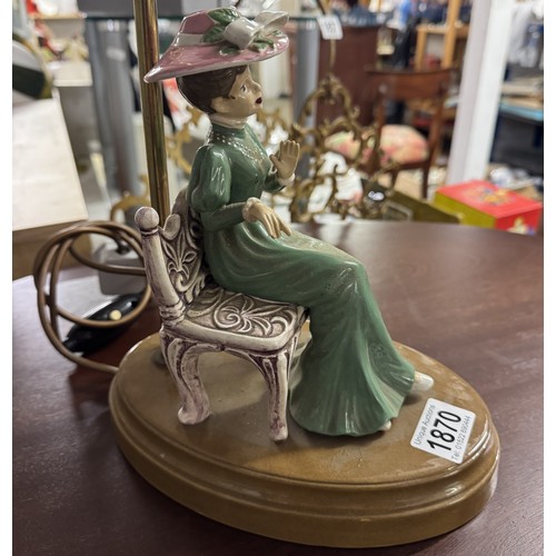 1870 - A vintage ceramic table lamp of a seated lady