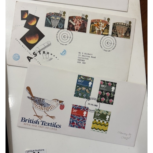 61 - An album and part album of mint UK stamps, mainly 1980s and early 1990s & first day covers etc