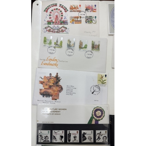 61 - An album and part album of mint UK stamps, mainly 1980s and early 1990s & first day covers etc