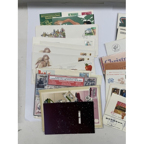 58 - A Royal Mail Millenium collection album & presentation packs (May 1999 - Jan 2001) & Other stamps