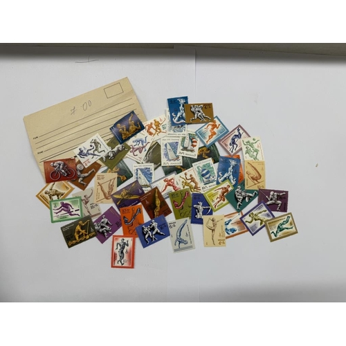 58 - A Royal Mail Millenium collection album & presentation packs (May 1999 - Jan 2001) & Other stamps