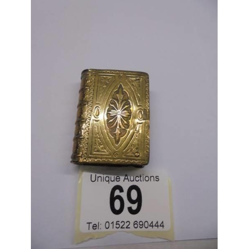 69 - A double ended brass match box.