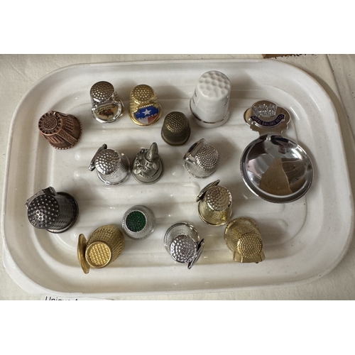 1909 - A collection of tourist collectors spoons & a quantity of thimbles