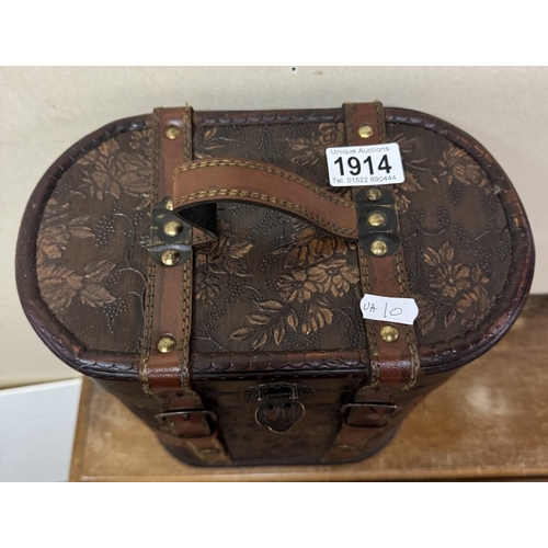 1914 - A retro leather bound bottle case