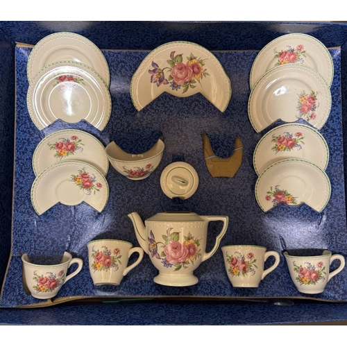 1917 - A vintage boxed Ellar decorated pottery tea set with floral design (missing jug)