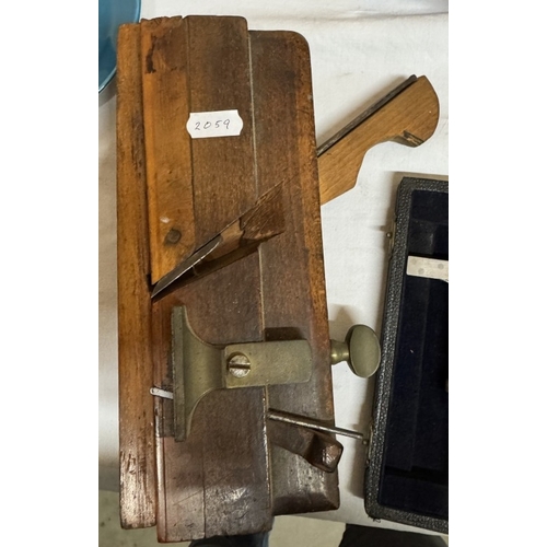 1941 - A vintage cased micrometre including Benson gauge. Preston & Sons leather tape & a moulding plane