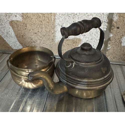 1971 - A pair of brass candlesticks & A quantity of other metal ware