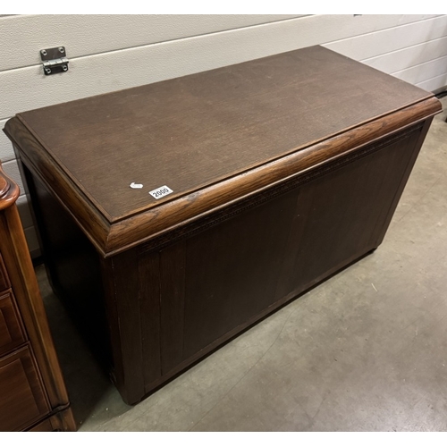 2000 - A mid 20th century oak blanket box.