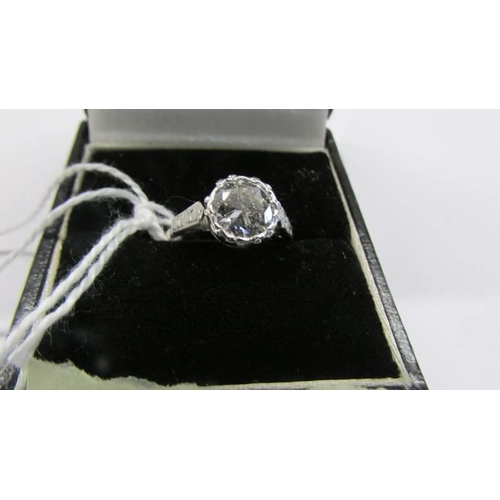 49 - A platinum and diamond ring size L, 3.67 grams.