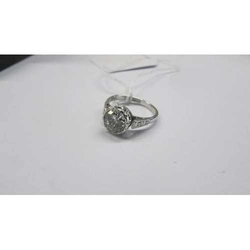 49 - A platinum and diamond ring size L, 3.67 grams.