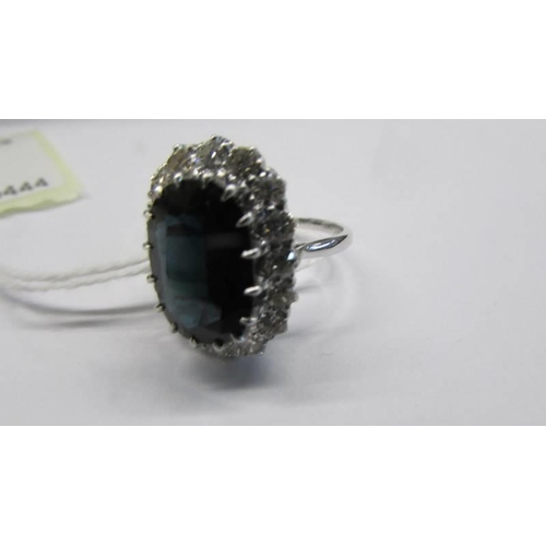 51 - A white gold sapphire and diamond ring, size P half, 6.26 grams.