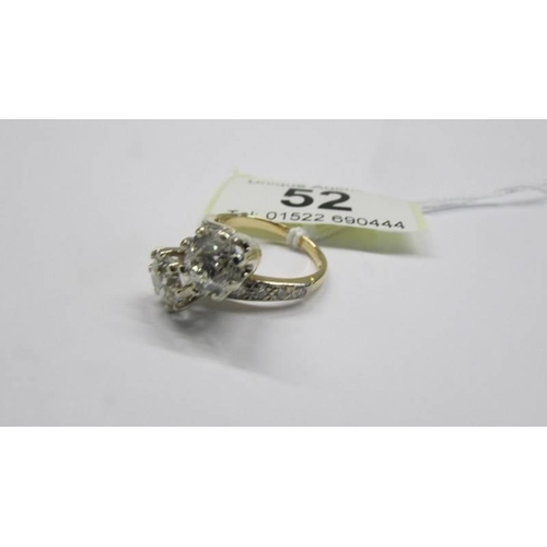 52 - An 18ct gold ring set two x two carat diamonds, size O, total weight 7.4 grams.