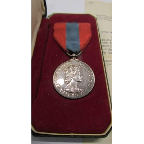 67 - An imperial service medal in presentation case with paperwork, presented to W drake, 1967.