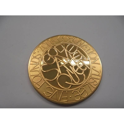 129 - A 2003 Queen Elizabeth II gold proof £5, struck for the 50th anniversary and features God Save the Q... 