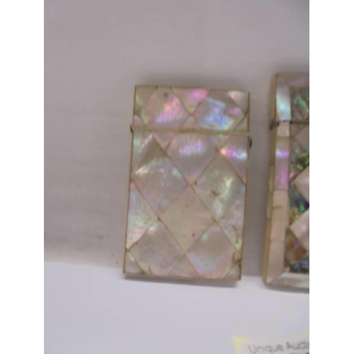 137 - A mother of pearl and abalone card case and an engraved example.