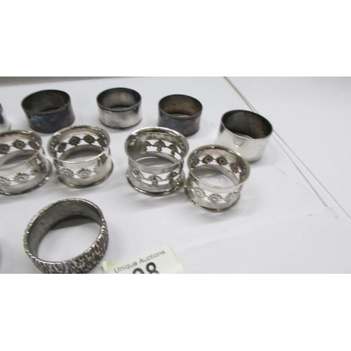 98 - Fifteen assorted silver plate napkin rings including a set of six.