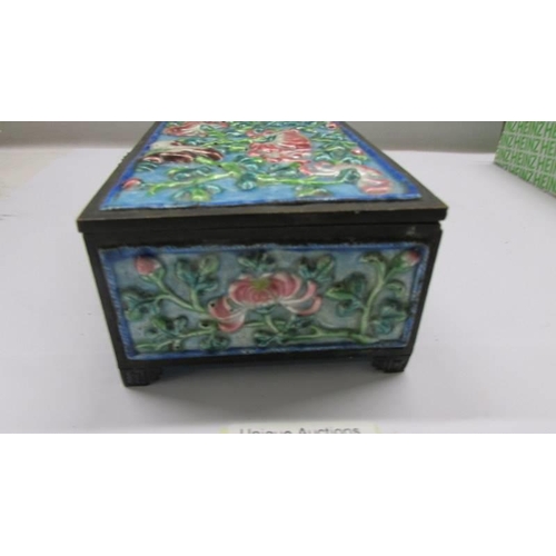 99 - An old Chinese repousse' cloissonne' enamel box, 11.5 x 8.5 x 5.25 cm.