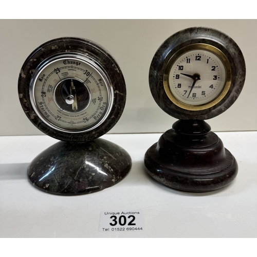 302 - A Cornish serpentine clock by Stevens & Sons Penzance & A Cornish serpentine barometer