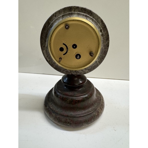 302 - A Cornish serpentine clock by Stevens & Sons Penzance & A Cornish serpentine barometer