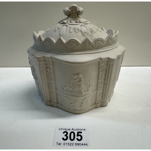 305 - An early 19th century salt glaze sugar caddy with lid. Relief decorated with mourning figures. A/F