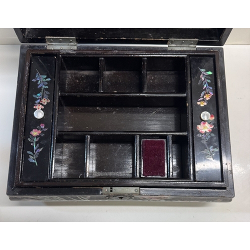 306 - A Japanese lacquered Mother of Pearl inlaid work box