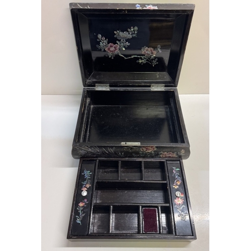 306 - A Japanese lacquered Mother of Pearl inlaid work box