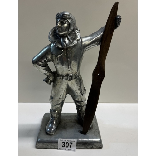 307 - A large figure of an aviator / pilot table lighter. Height 27cm