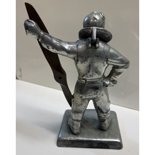 307 - A large figure of an aviator / pilot table lighter. Height 27cm