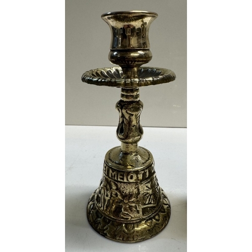 308 - A pair of brass tavern bell candlesticks