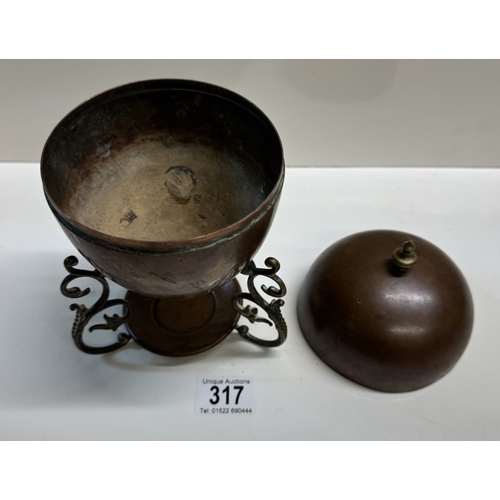 317 - A 19th century copper & brass egg coddler