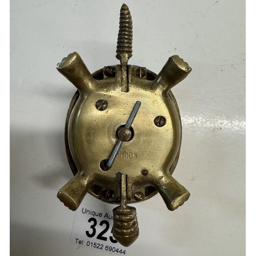 325 - A vintage brass novelty turtle counter top clockwork bell