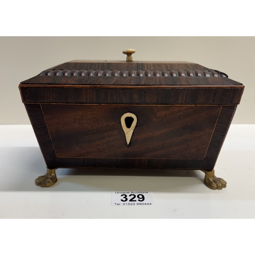 329 - A Regency mahogany tea caddy