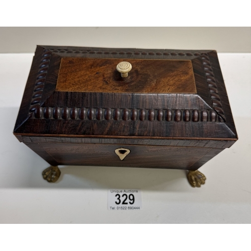 329 - A Regency mahogany tea caddy