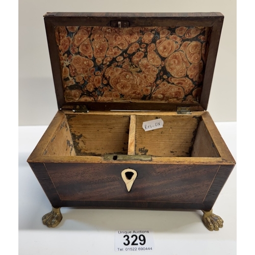 329 - A Regency mahogany tea caddy