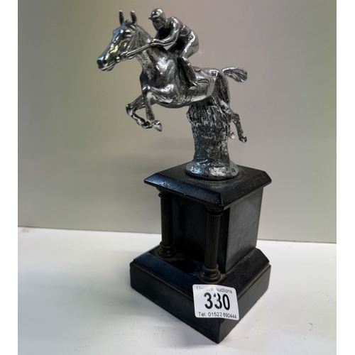 330 - A car mascot of a race horse mounted on a black marble base