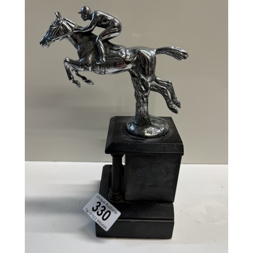 330 - A car mascot of a race horse mounted on a black marble base