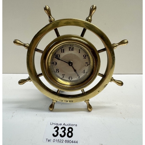 338 - A 1930's brass ships wheel clock