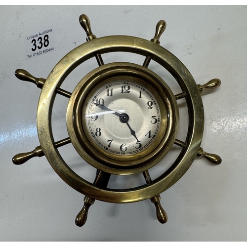 338 - A 1930's brass ships wheel clock