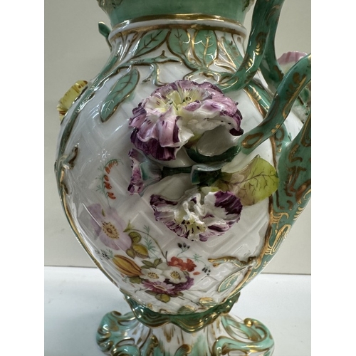 345 - A pair of continental ceramic vases with floral decoration & another continental floral decorated va... 