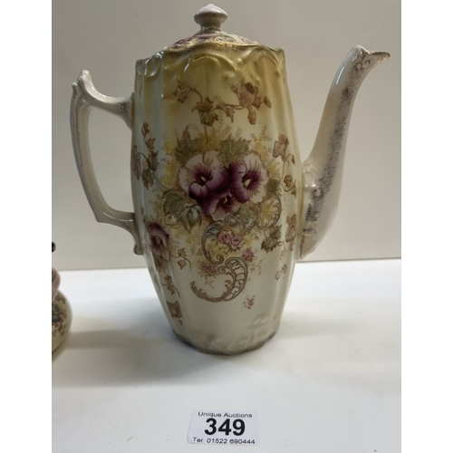 349 - An early 20th century floral pattern coffee pot, sugar bowl & 1 other item