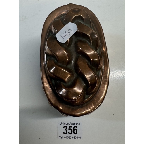 356 - A Victorian copper & steel jelly mould stamped '1 1/2 cm 200'